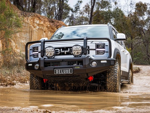 ironman 4x4 aluminium deluxe bull bar for byd shark 6   driving through muddy puddle 1