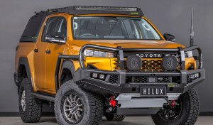 toyota hilux n90 2026 sunglow orange with ironman 4x4 apex bull bar front three quarter angle gallery